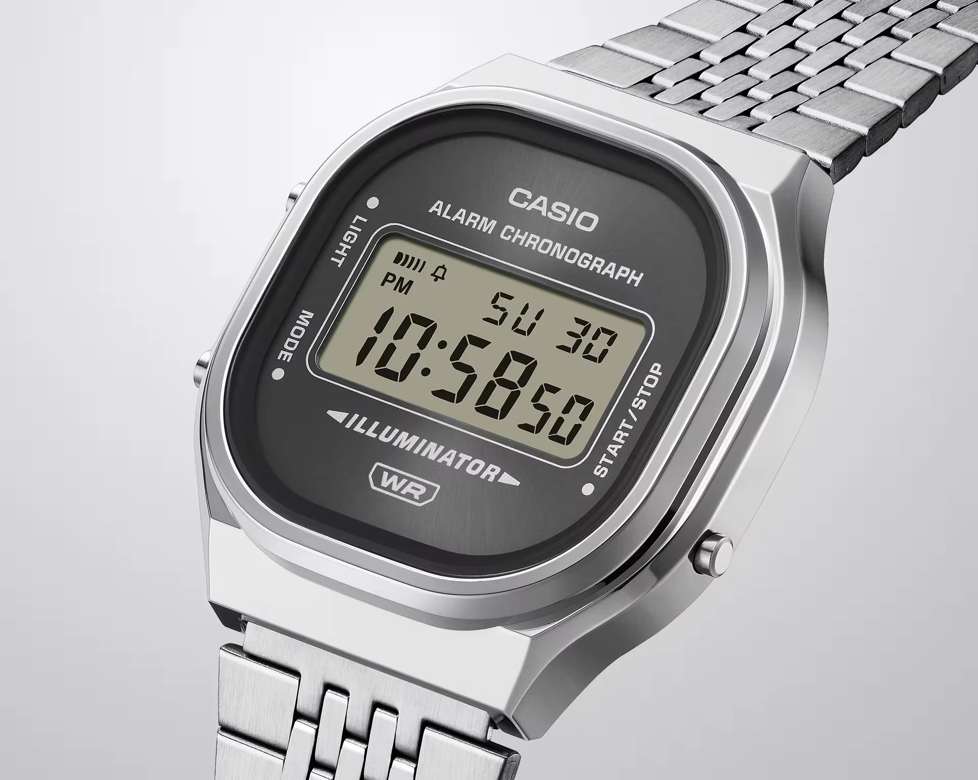 Detalhe do mostrador digital com efeito raiado do Casio A140WE