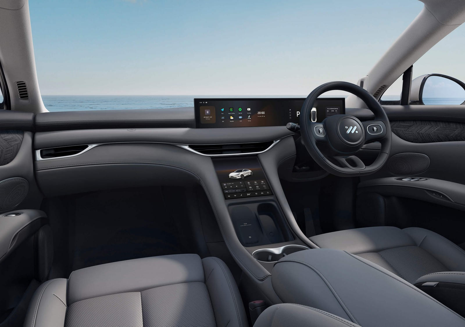 Painel do IM6 com a tela panorâmica e o volante